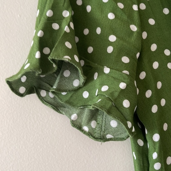 NWT Green romper with white polka dots with frilly edges on sleeve and bottom - Picture 3 of 4